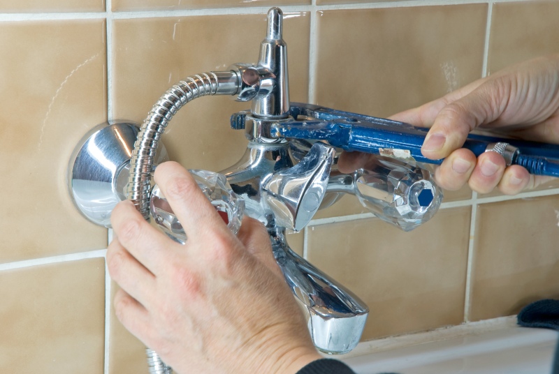 Shower being installed in a South Lambeth bathroom